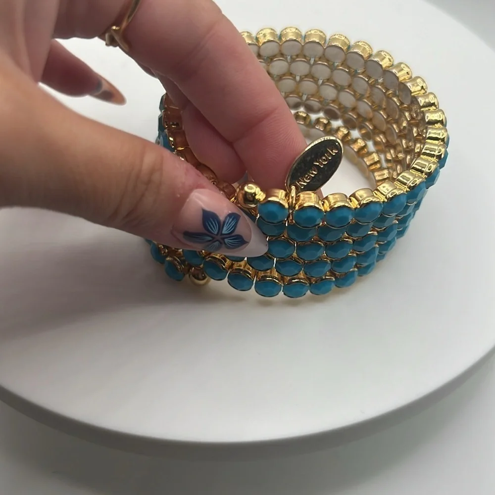 1349. Cara‎ New York Elegant Gold and Blue Wraparound Bracelet